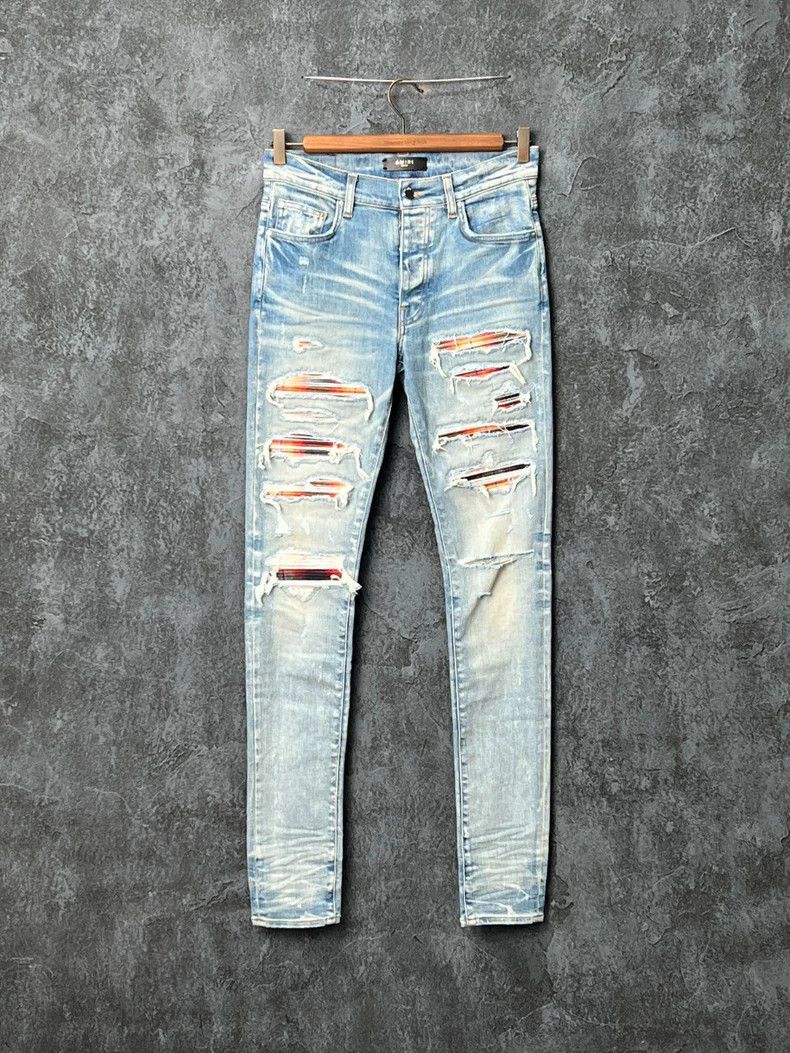 Amiri leather logo multi-pocket destroyed denim pants