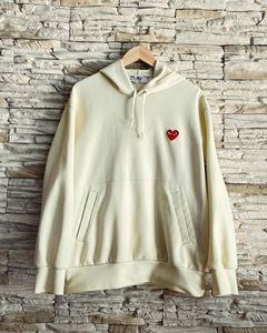 Cdg hoodie clearance cream