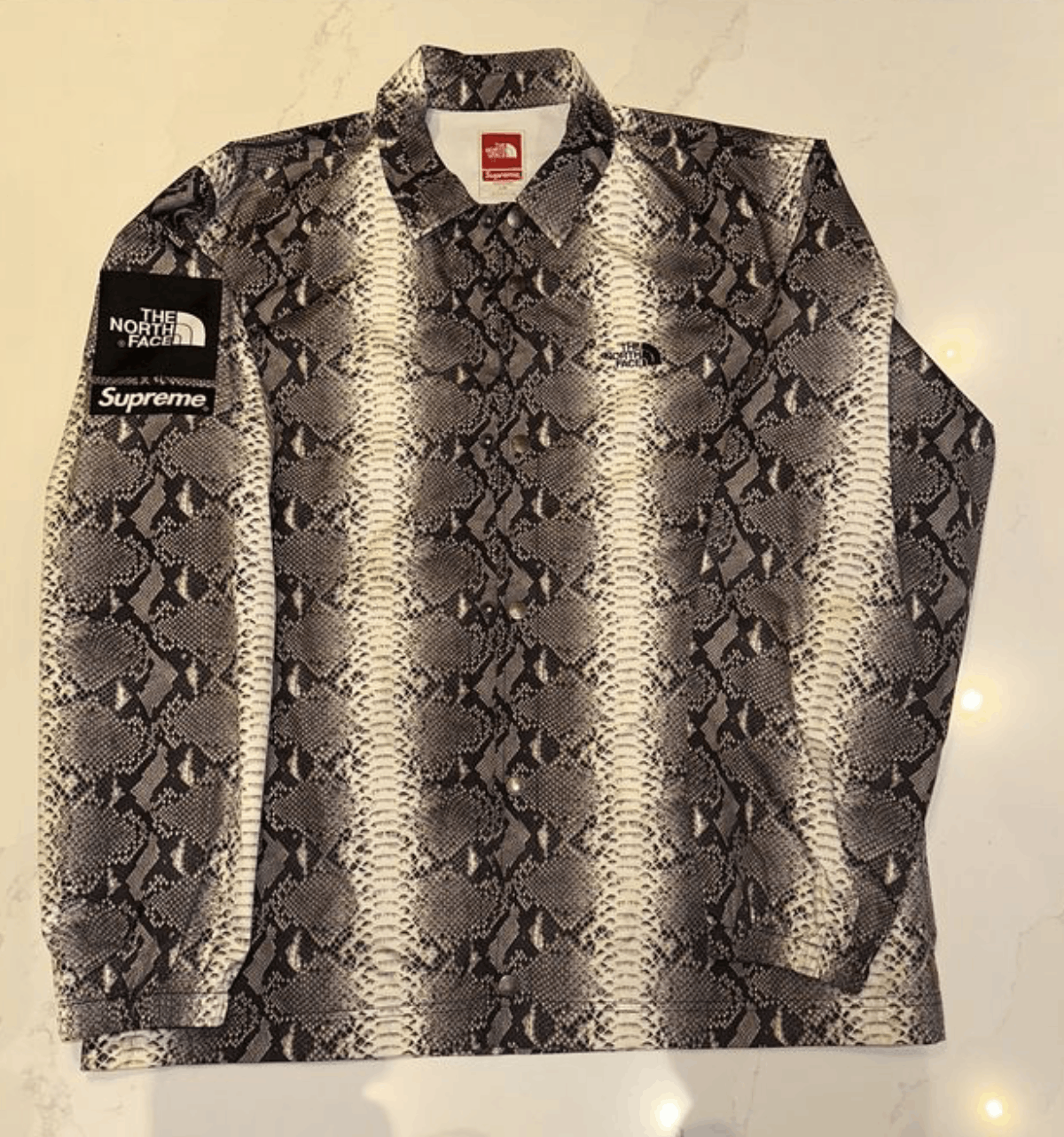 Supreme x The North Face Snakeskin Coaches Jacket