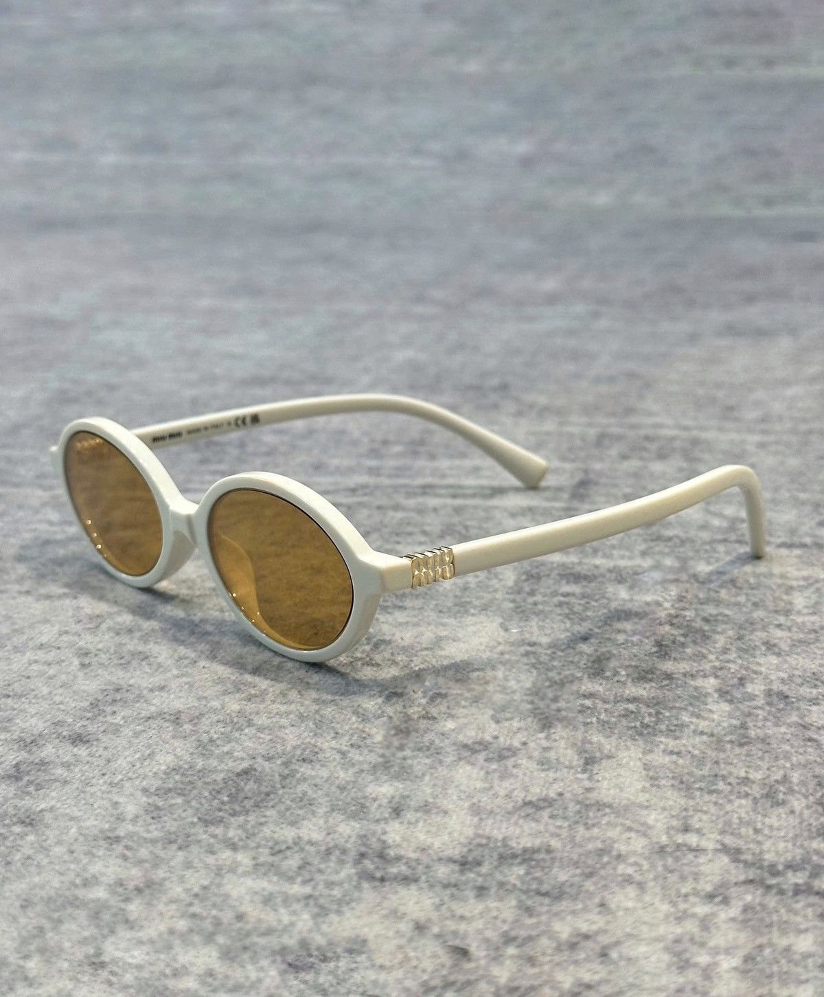 Miu Miu MIU MIU 0MU 04ZS 14240D Size ONE SIZE - 1 Thumbnail