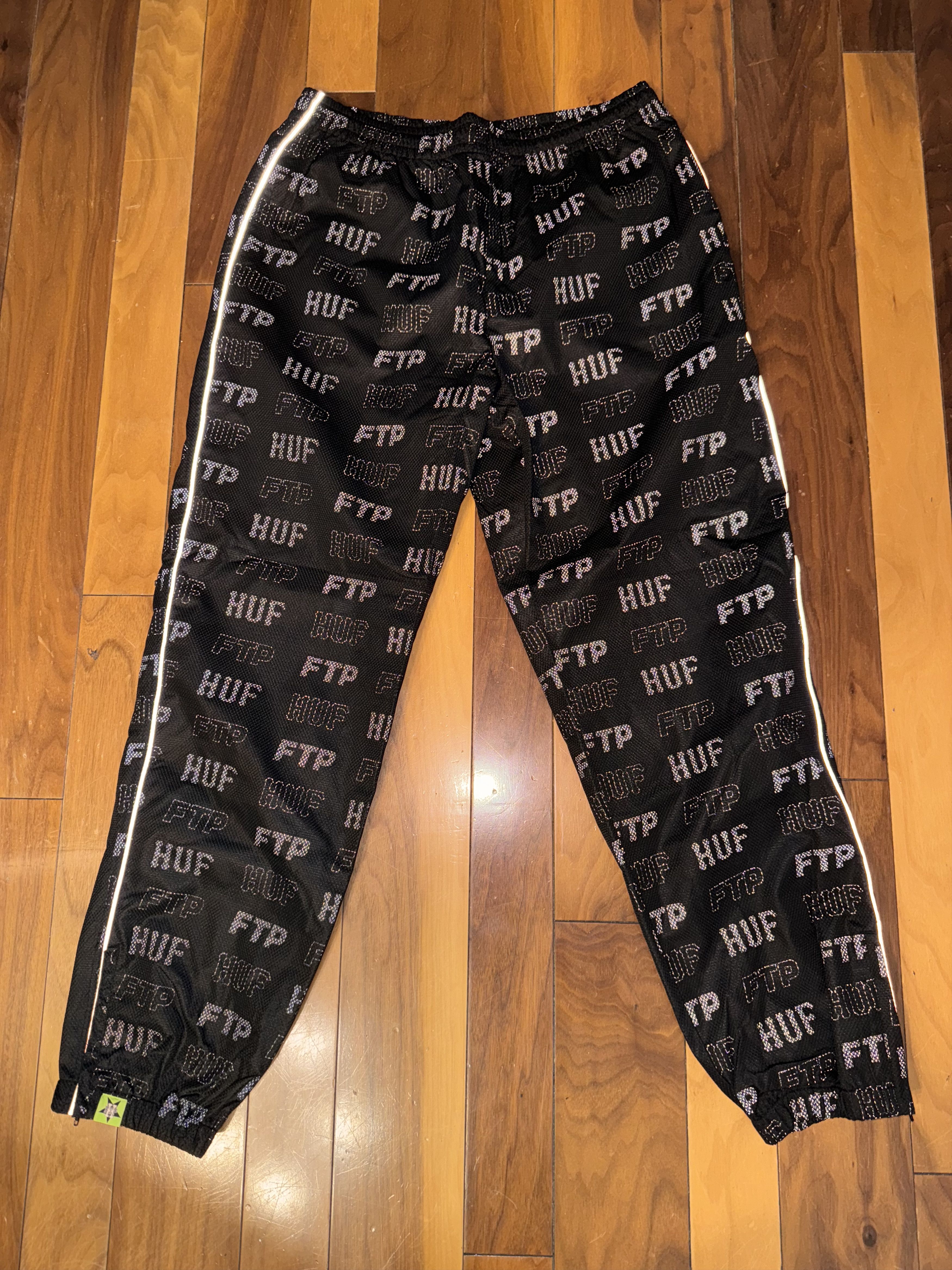image of Fuck The Population x Huf Ftp X Huf Allover Reflective Track Pants in Black, Men's (Size 36)