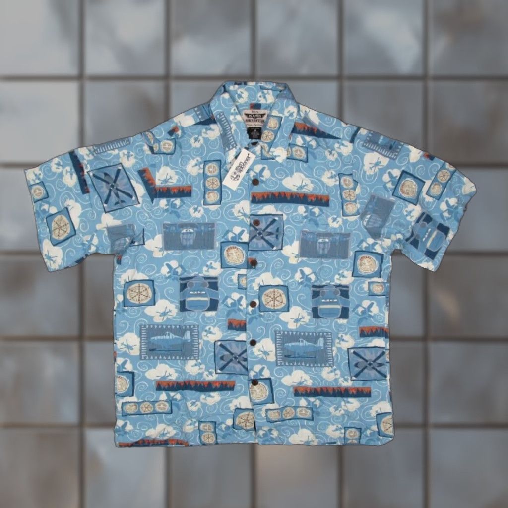 Reyn Spooner REYN SPOONER DISNEY Men Blue short sleeve button up Hawaiian shirt w/ AOP "Planes Fire & Rescue" movie themed design - 100% rayon - made in USA Size US S / EU 44-46 / 1 - 1 Thumbnail