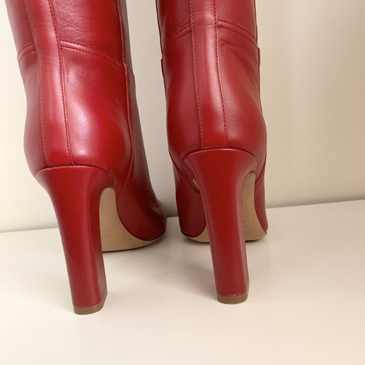 Red calfskin knee boots