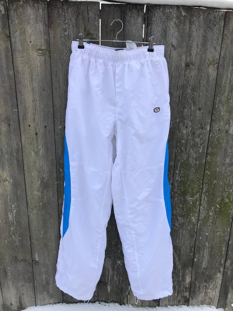 image of Nike Tn Vintage Pants in White Blue, Men's (Size 32)