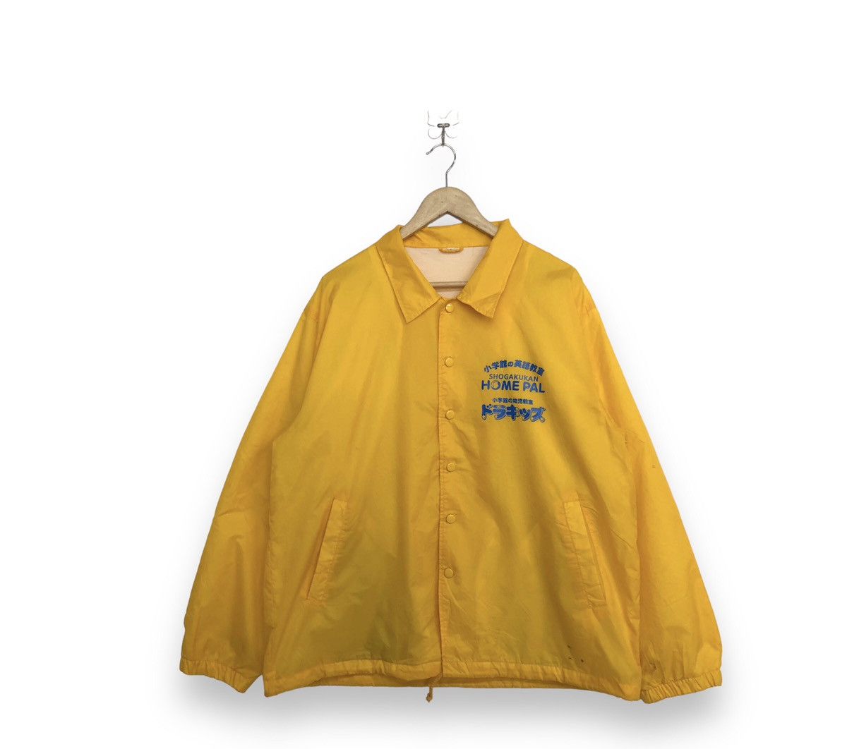 image of Anima Doraemon Coach Jacket Shokakugan English Class in Yellow, Men's (Size Large)