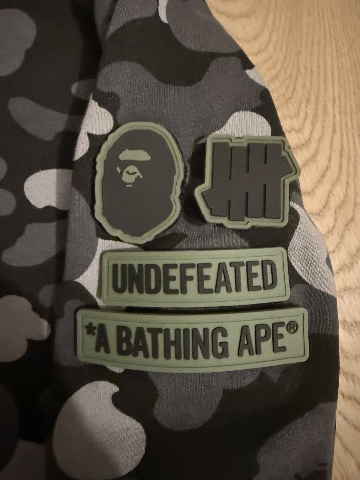 Bape × Undefeated Bape x Undefeated (open to offers) Size US M / EU 48-50 / 2 - 4 Thumbnail