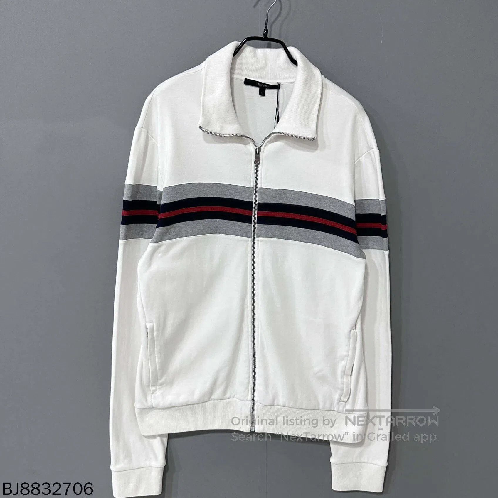 striped zip-up jacket by gucci.