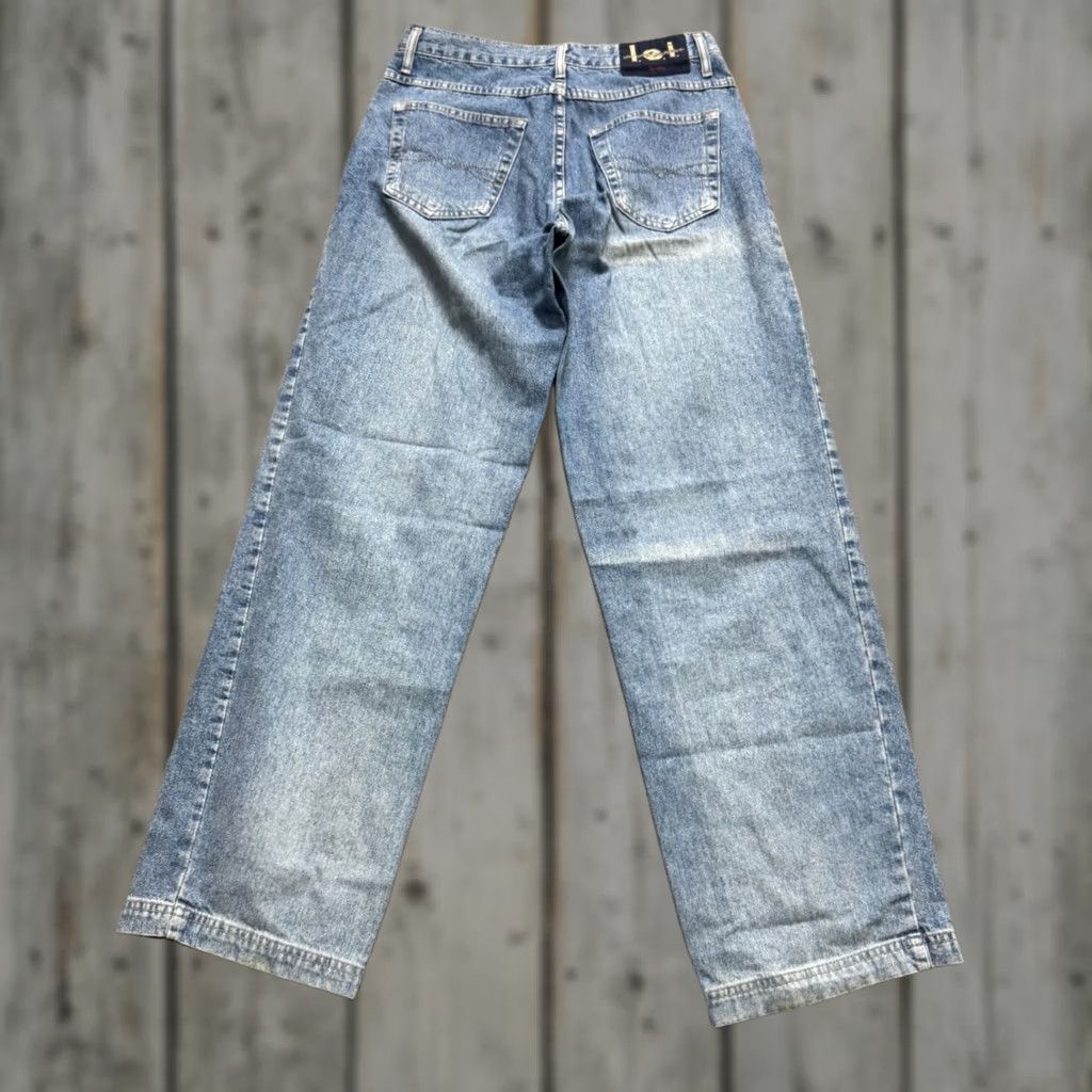 Vintage VINTAGE LEI Jeans Woman Dark Wash Flare Leg Denim Pants Cotton Size 8 Wide Leg Jeans Womens Size 30" / US 8 / IT 44 - 1 Thumbnail