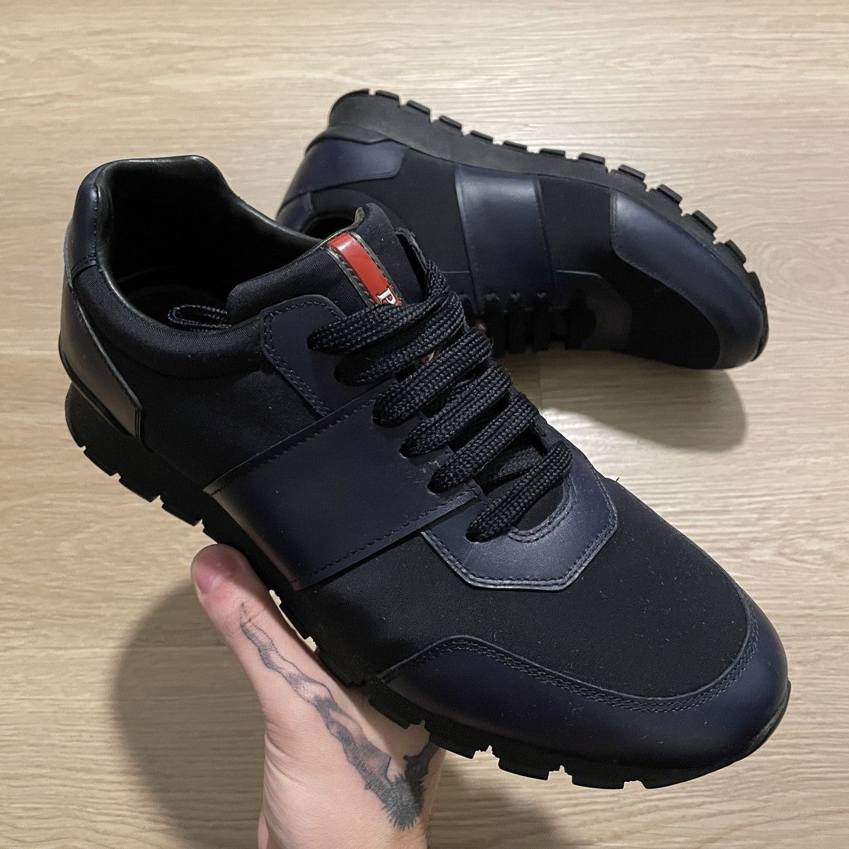 Prada runners outlet black