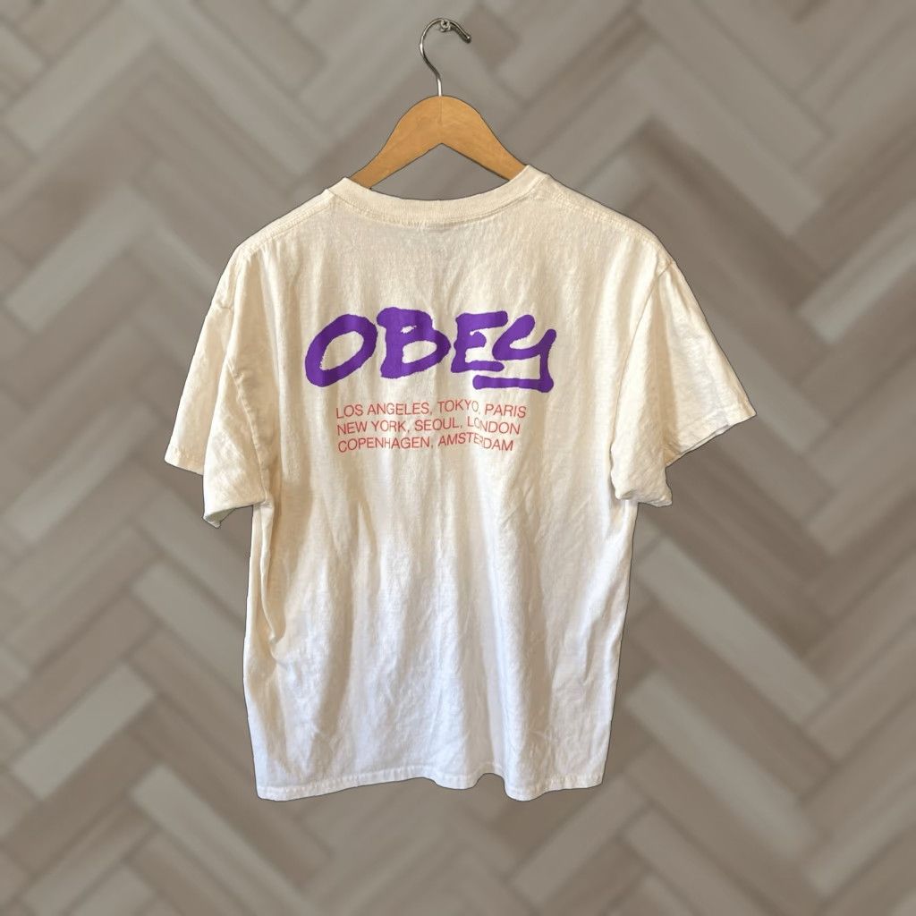Obey OBEY Mens T-Shirt Short Sleeve Graphic Ivory Labeled Size L White 90s? Size US L / EU 52-54 / 3 - 1 Thumbnail
