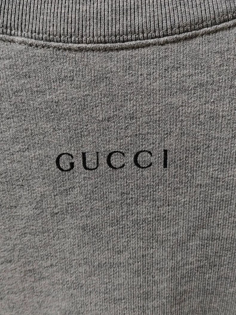 GucciDisney co-branded Donald Duck cartoon printed round-ne