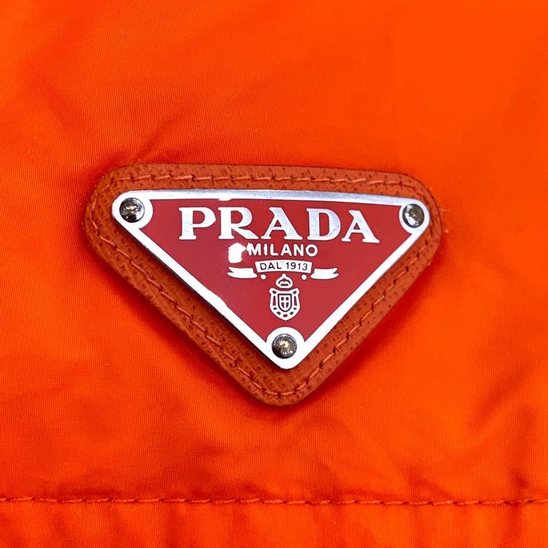Prada Prada Orange glossy triangle down jacket 2501-Nextarrow Size US L / EU 52-54 / 3 - 5 Thumbnail