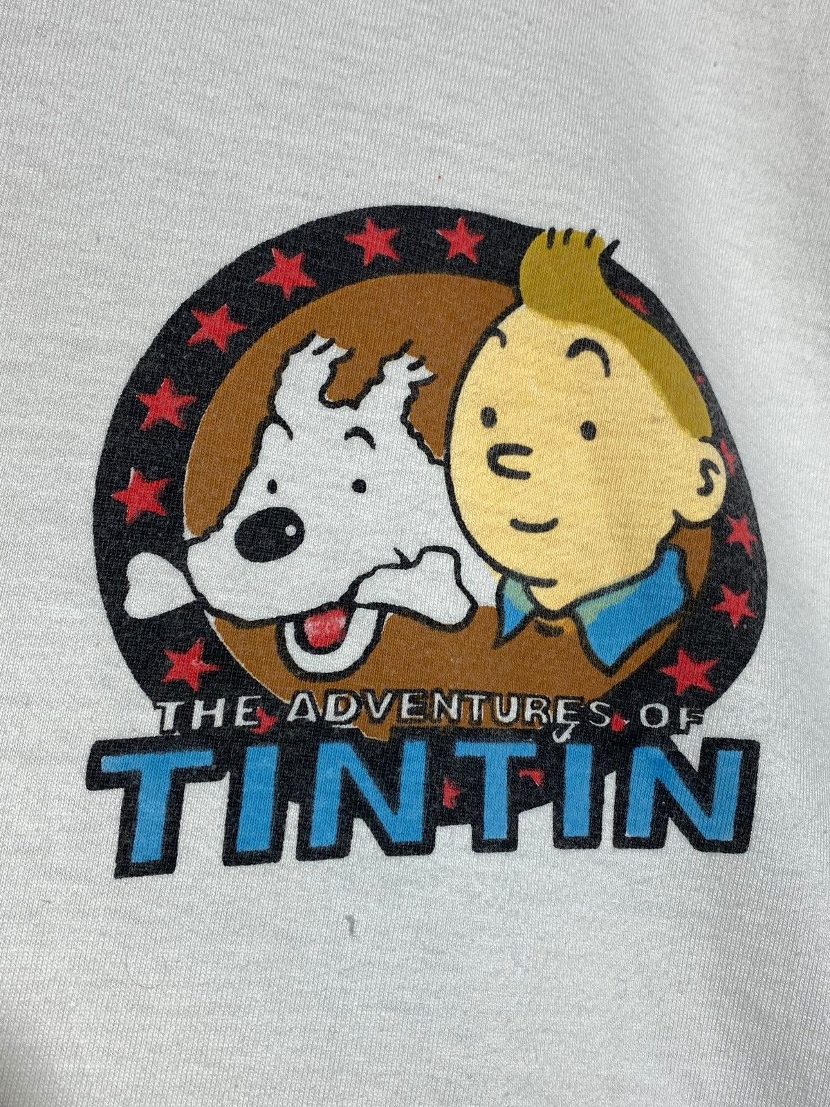 Cartoon Network 🔥 TINTIN IN AMERICA 90s GRAPHIC TEE USA INDIGENOUS VIBES Size US M / EU 48-50 / 2 - 7 Thumbnail