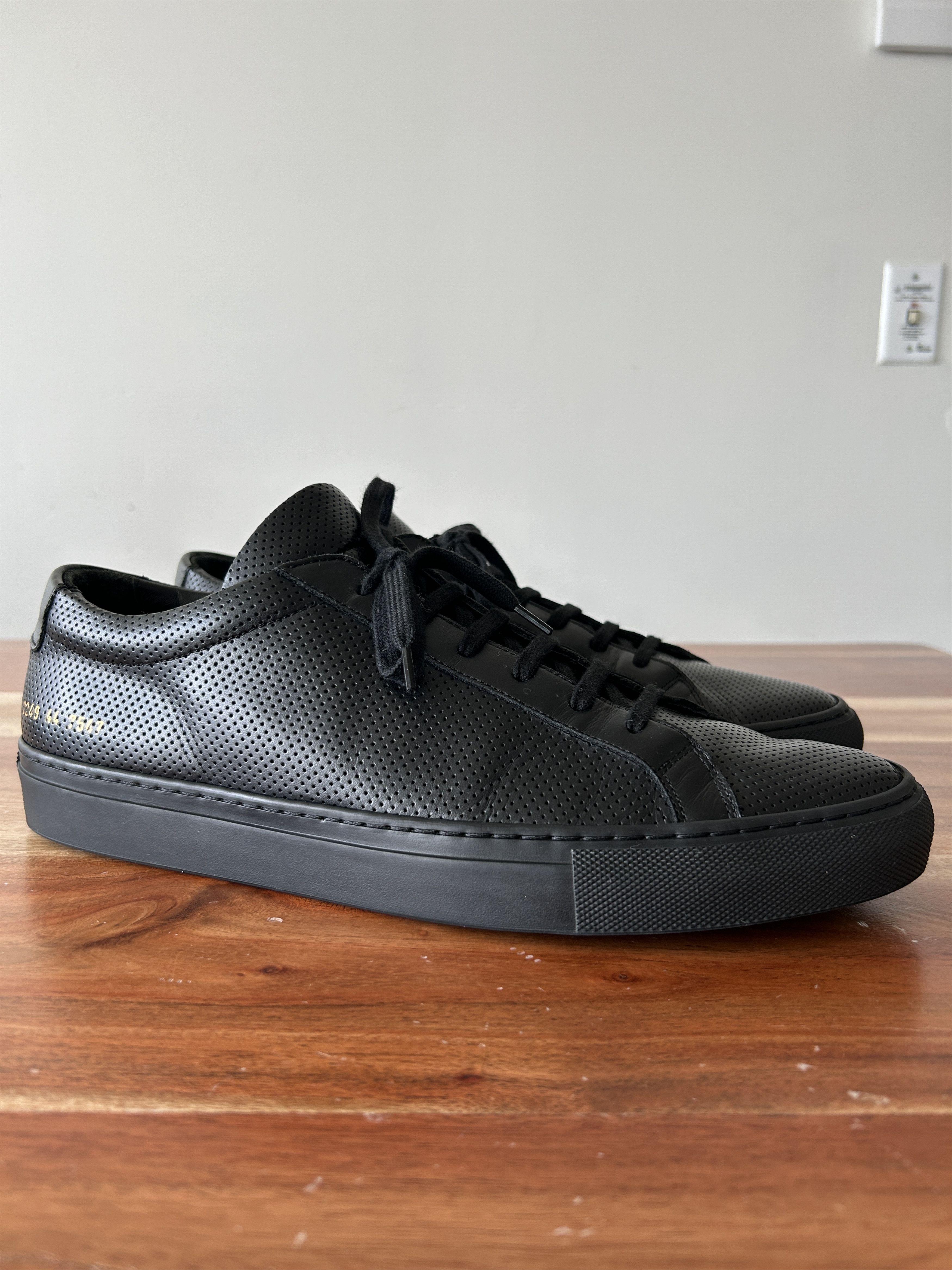 Common Projects Black Perforated Achilles Low Sneakers Grailed