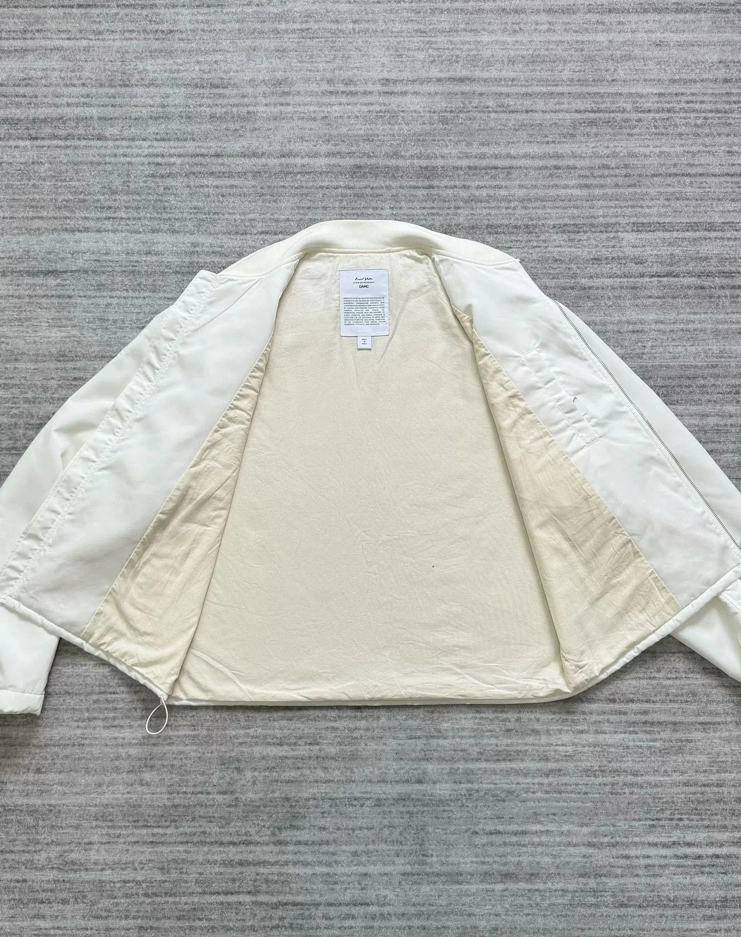 OAMC white patch bomber jacket by OAMC. Size US S / EU 44-46 / 1 - 3 Thumbnail