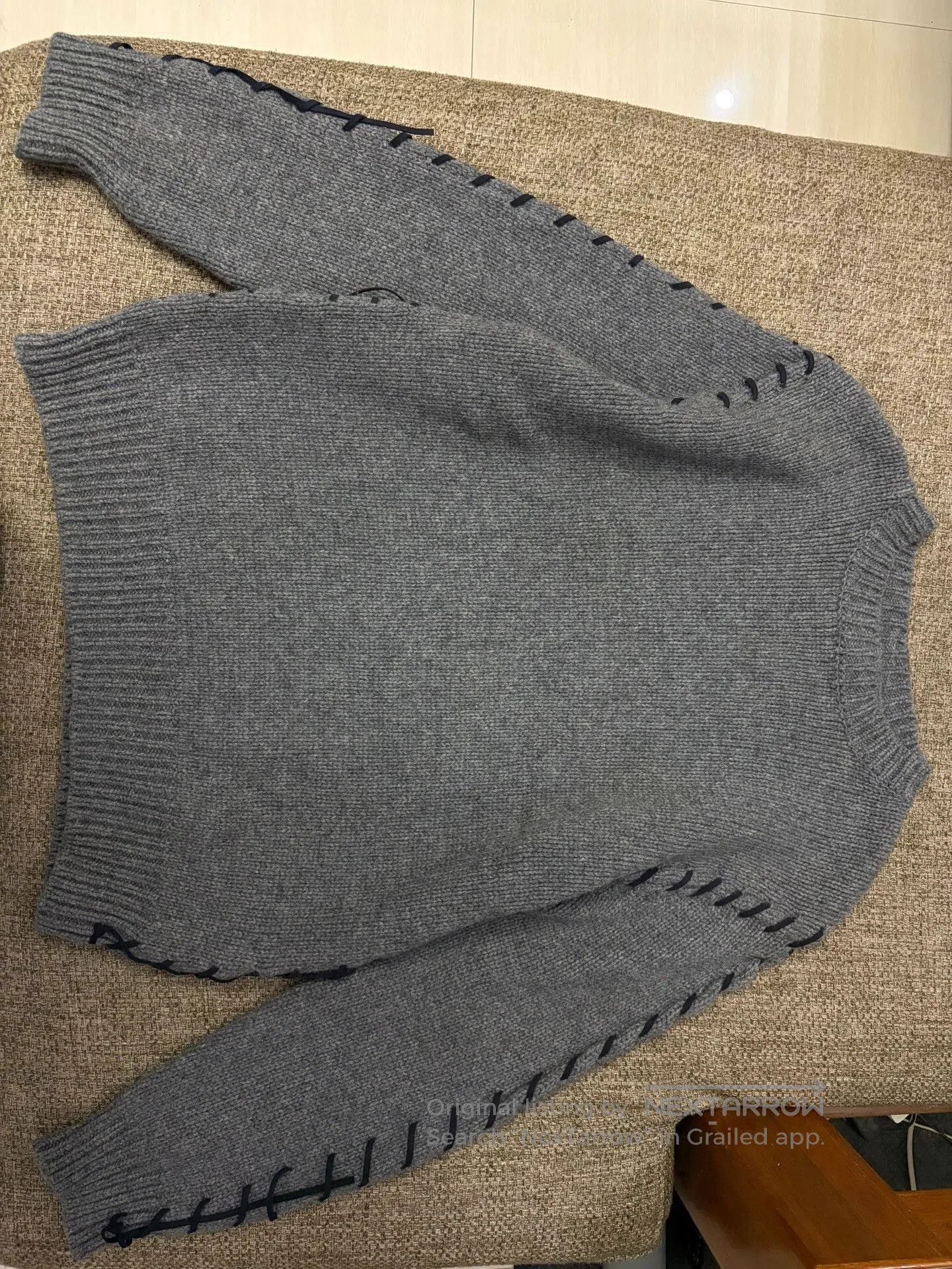 Discovered Knit Sweater with Contrast Stitching.