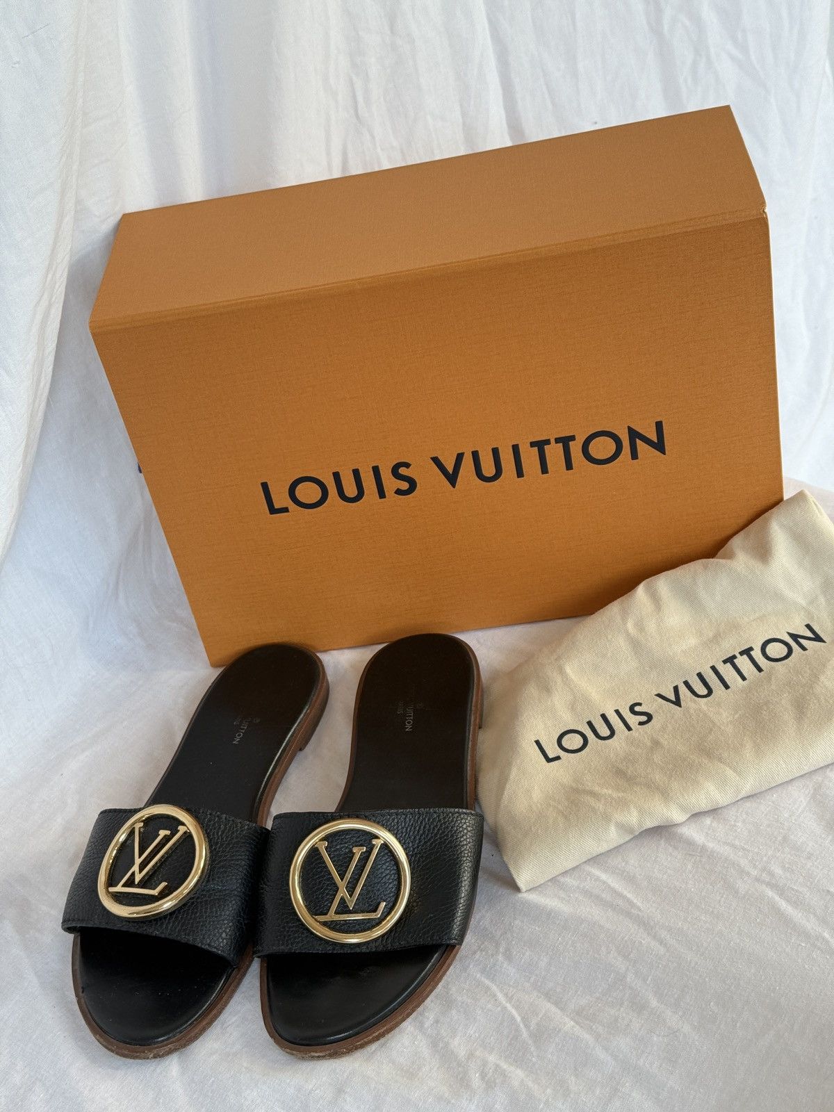 Louis Vuitton Louis Vuitton Lock It Black Leather Sandals Flip Flops Size US 7 / IT 37 - 1 Thumbnail