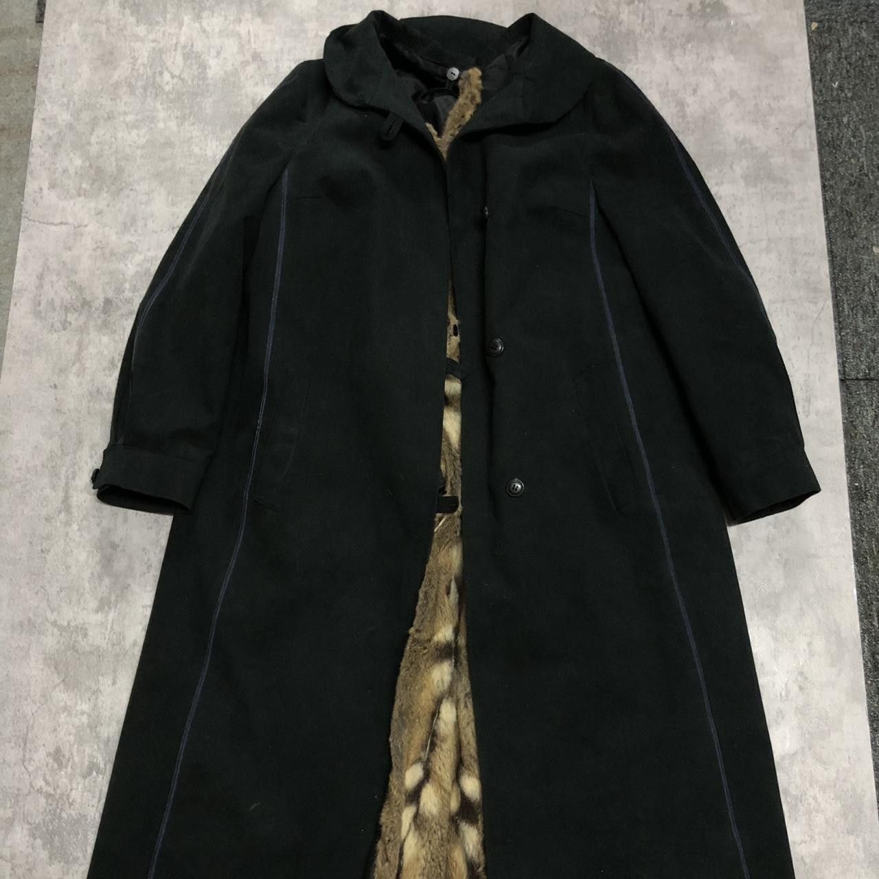 Black and brown faux fur coat with a touch of elegance