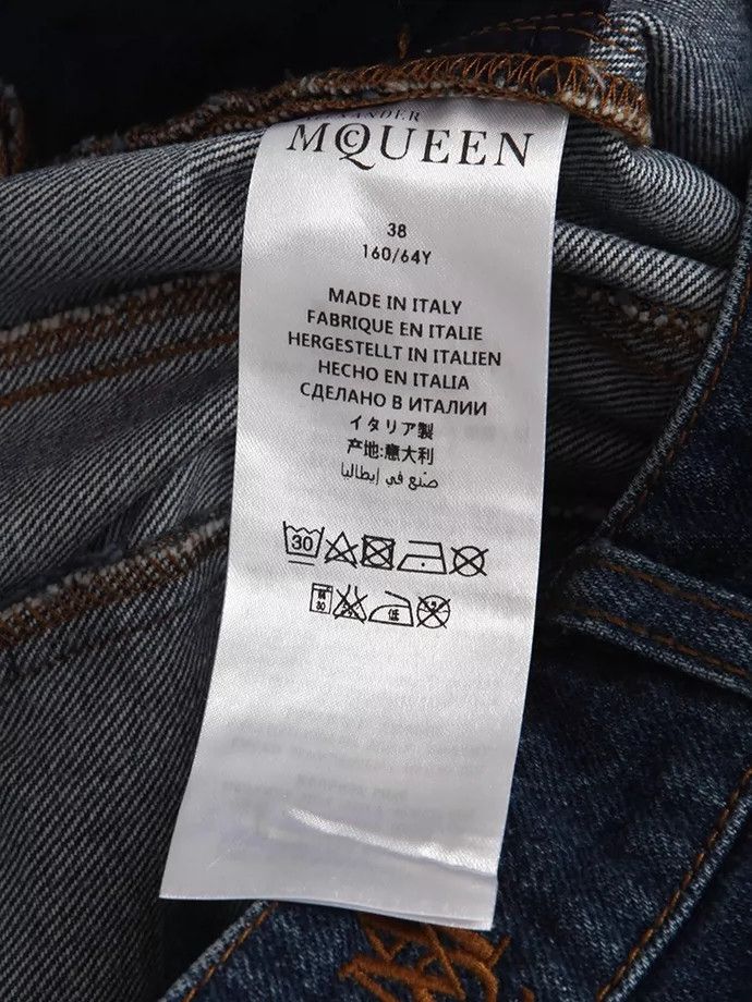 Alexander Mcqueen Denim stitched flared trousers