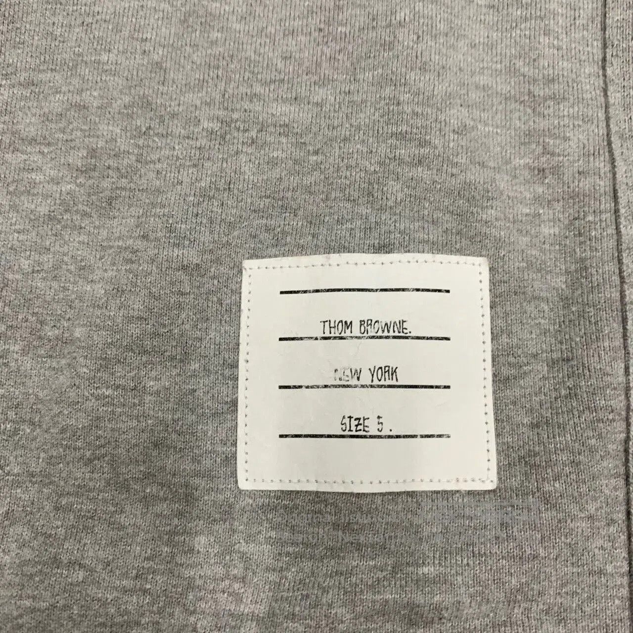 thom browne grey striped sweatshirt for men.