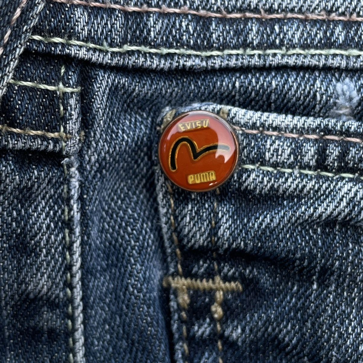 VINTAGE Y2K EVISU X PUMA DISTRESSED WASHED DENIM PANTS
