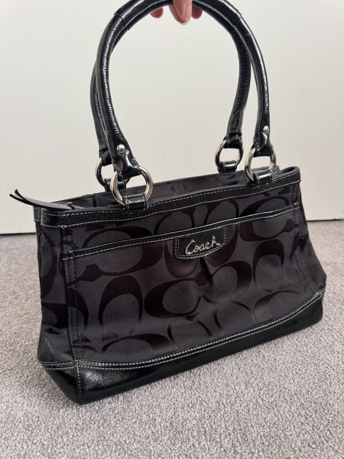 Black fabric/leather Coach shoulder bag with silver buckles