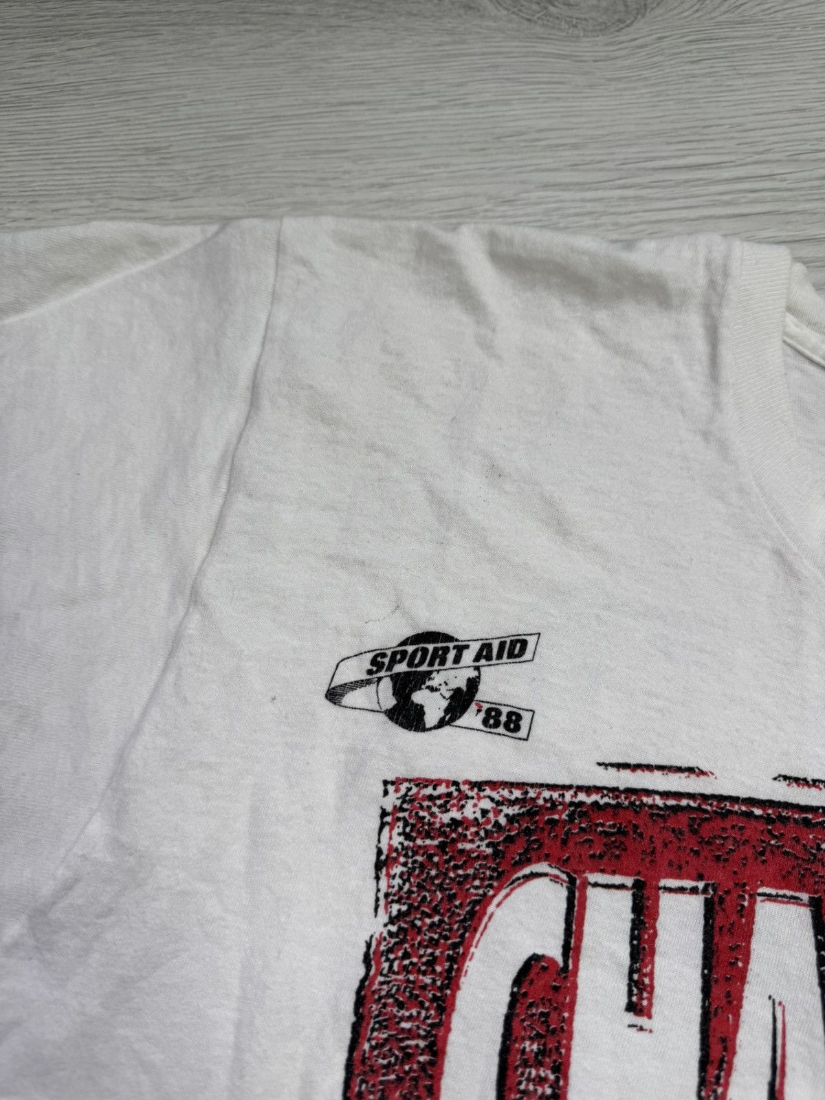Signal Sport × Vintage 1988 SPORT AID STATUS QUO I CHANGED THE WORLD T-SHIRT (L) Size US XL / EU 56 / 4 - 6 Thumbnail