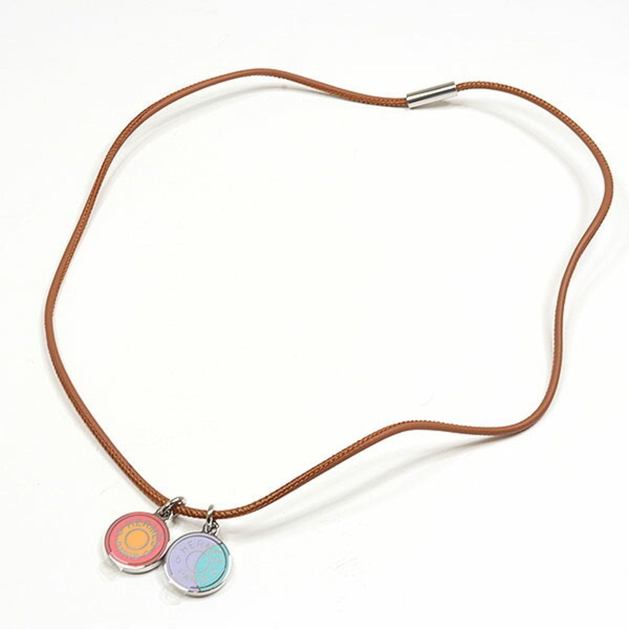 image of Hermes Pendant Eclipse Acidure Necklace Clous De Sel Sun Moon Lacquered Metal Leather in Black, Wom