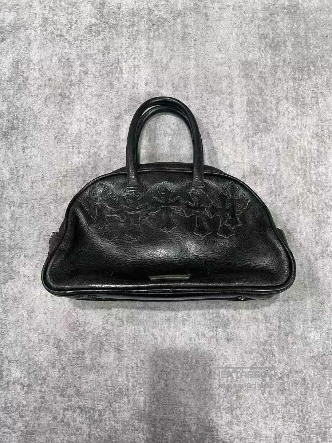 chrome hearts black leather bowling bag.