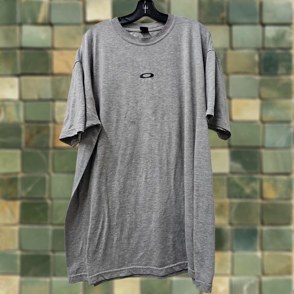 Oakley VINTAGE Oakley Shirt Center Logo Mens 2XL Black Distressed Short Sleeve 90s USA Logo Graphic Print Naughty? Size US XXL / EU 58 / 5 - 1 Thumbnail