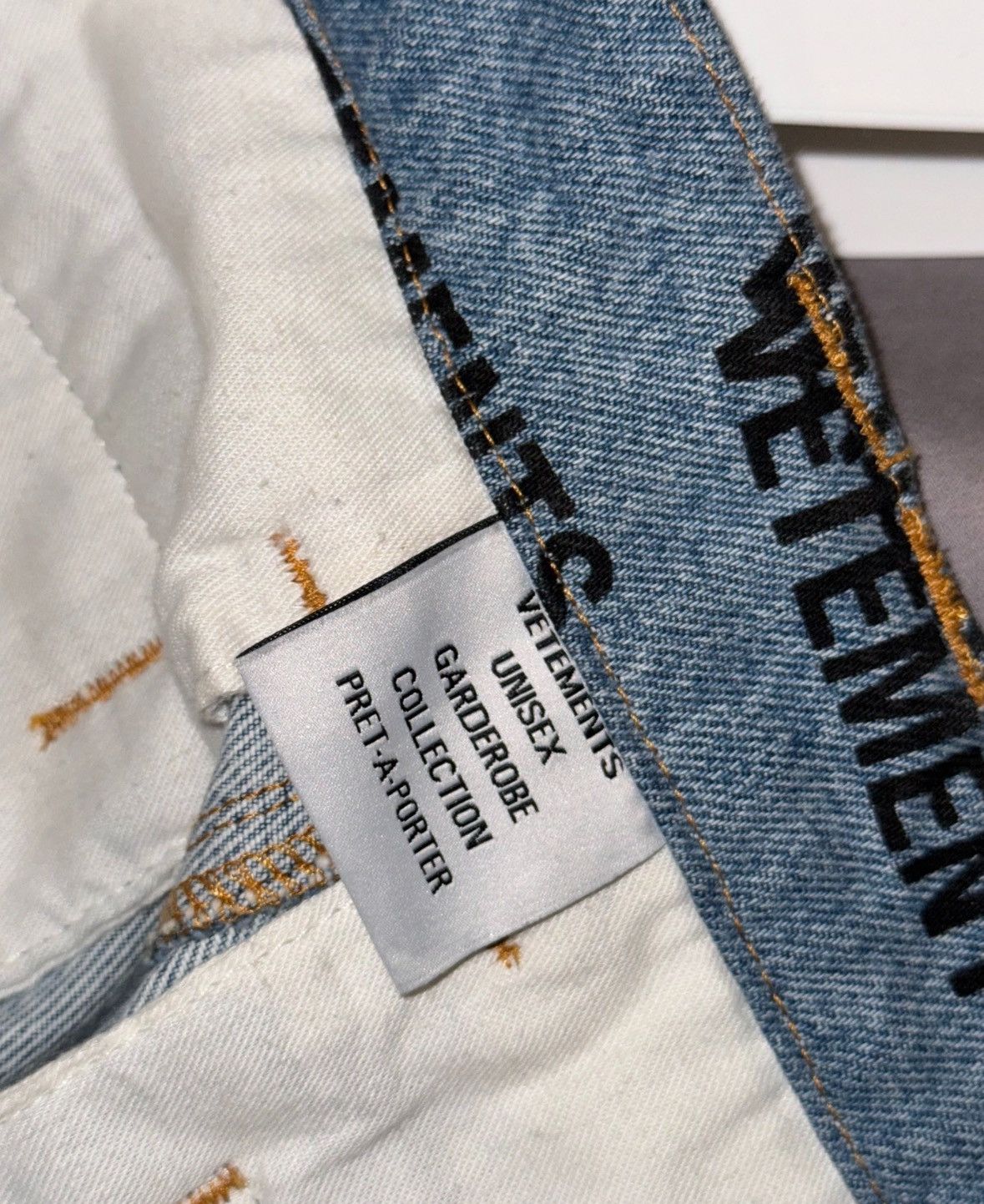 All over stamped logo transformer jeans