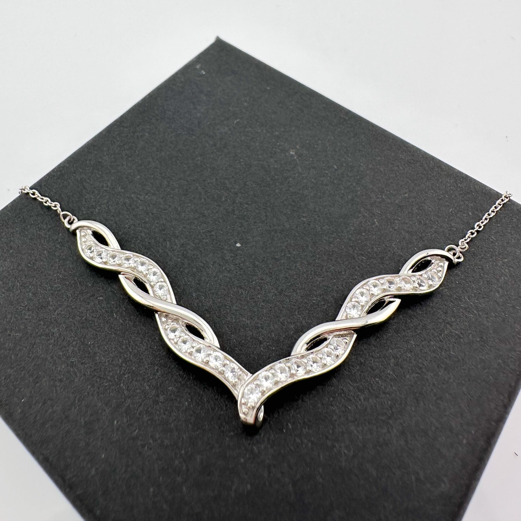 Other Elegant Twisted Silver White Sapphire Evening Necklace Size ONE SIZE - 11 Thumbnail