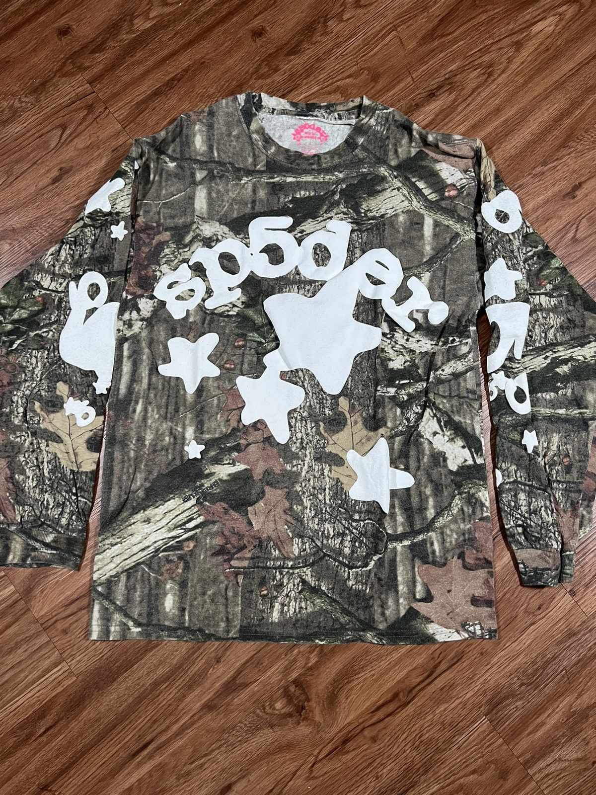 image of Spider Worldwide x Young Thug Sp5Der Worldwide Beluga Real Tree Camo Long Sleeve Shirt in Realtree 