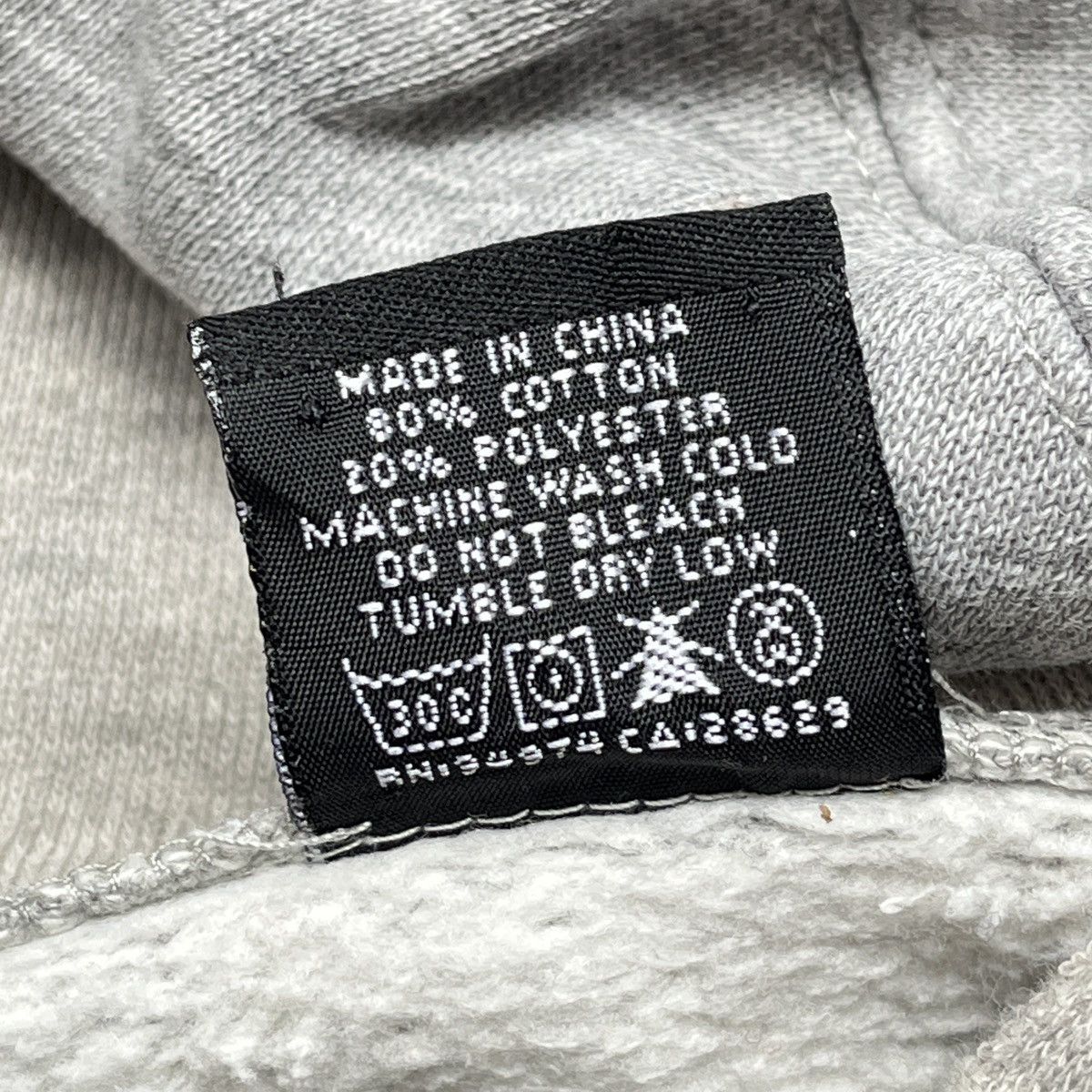 VINTAGE STUSSY SKULL BIG LOGO FRONT DISTRESSED HOODIE