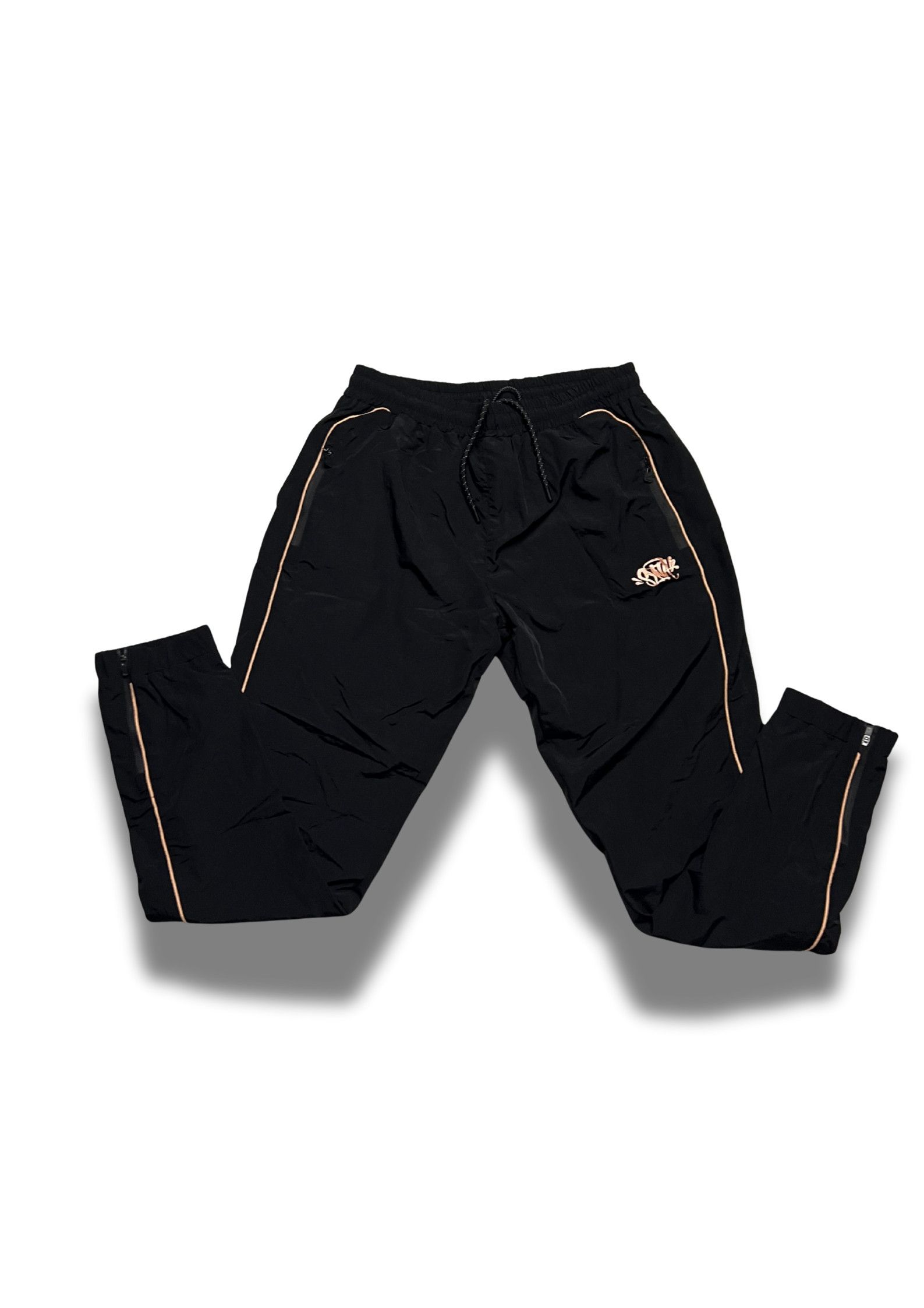Syna World Syna World Shell Tracksuit “BLACK / GOLD” CHECK Description Size US S / EU 44-46 / 1 - 7 Thumbnail