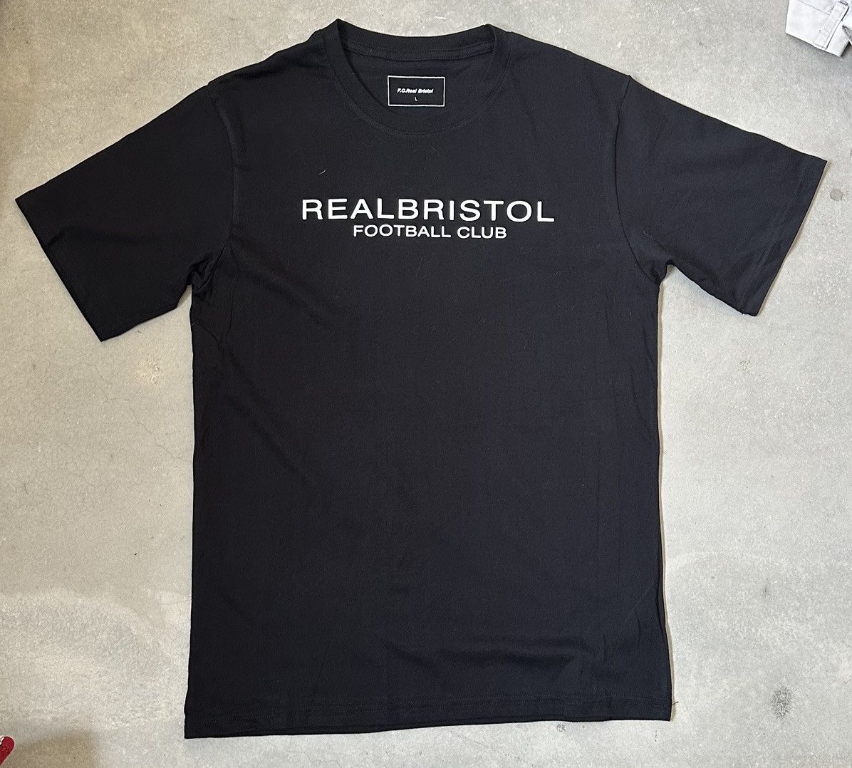 F.C. Real Bristol F.C. REAL BRISTOL SPELLOUT TEE Size US L / EU 52-54 / 3 - 1 Thumbnail