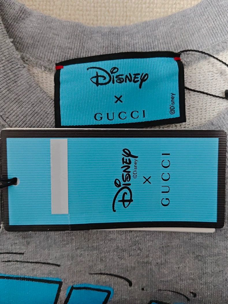 GucciDisney co-branded Donald Duck cartoon printed round-ne