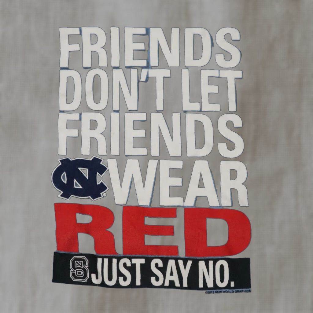 Delta NCAA "Friends Don't Let Friends Wear Red..." Tar Heel Backer Blue T Shirt Medium Mens Size US M / EU 48-50 / 2 - 1 Thumbnail