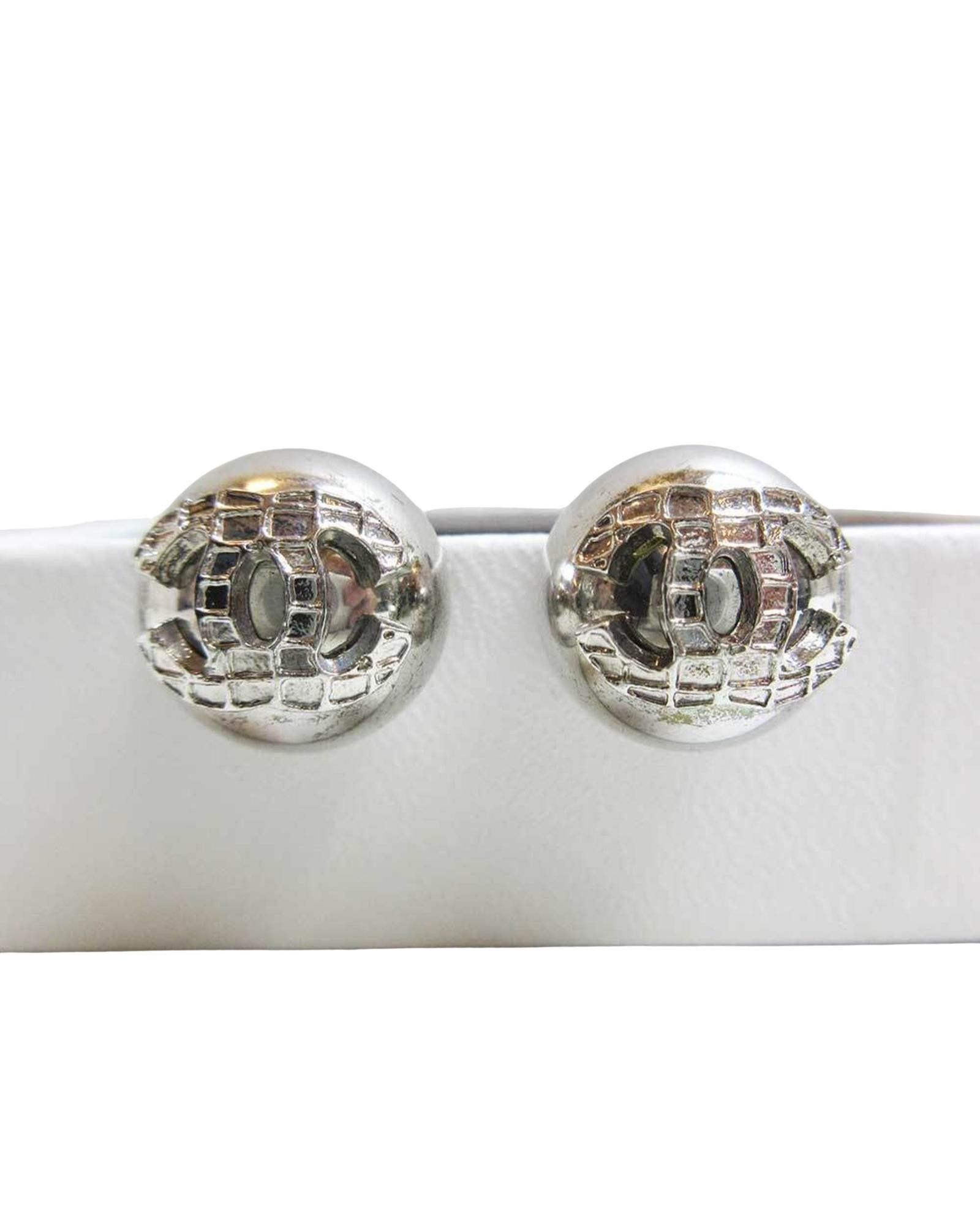 image of Chanel Sophisticated Metal Clip Earrings With Iconic Design in Silver, Women's