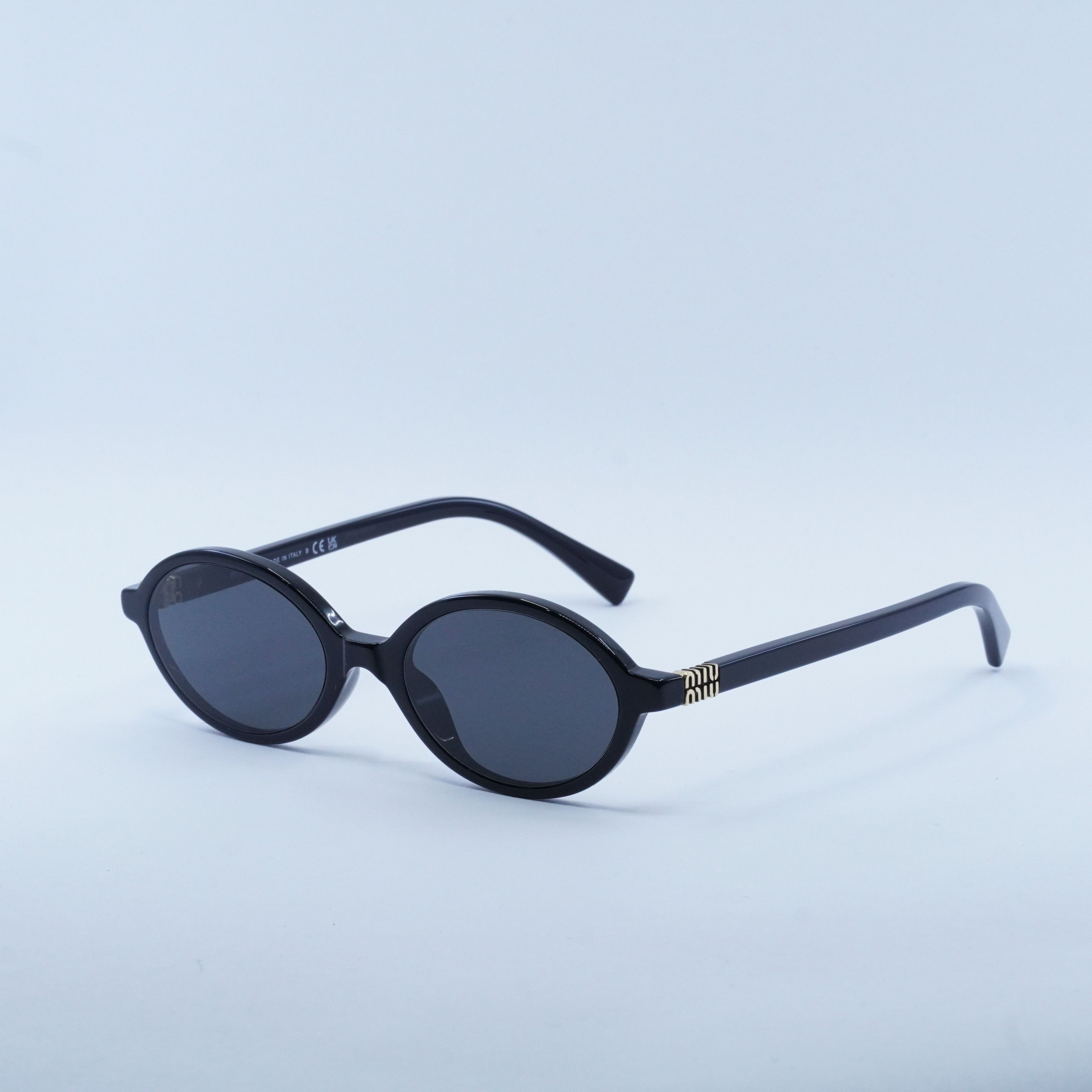 Miu Miu MU04ZS 1AB5S0 Sunglasses Black Oval Frame, Grey Lens display picture 1