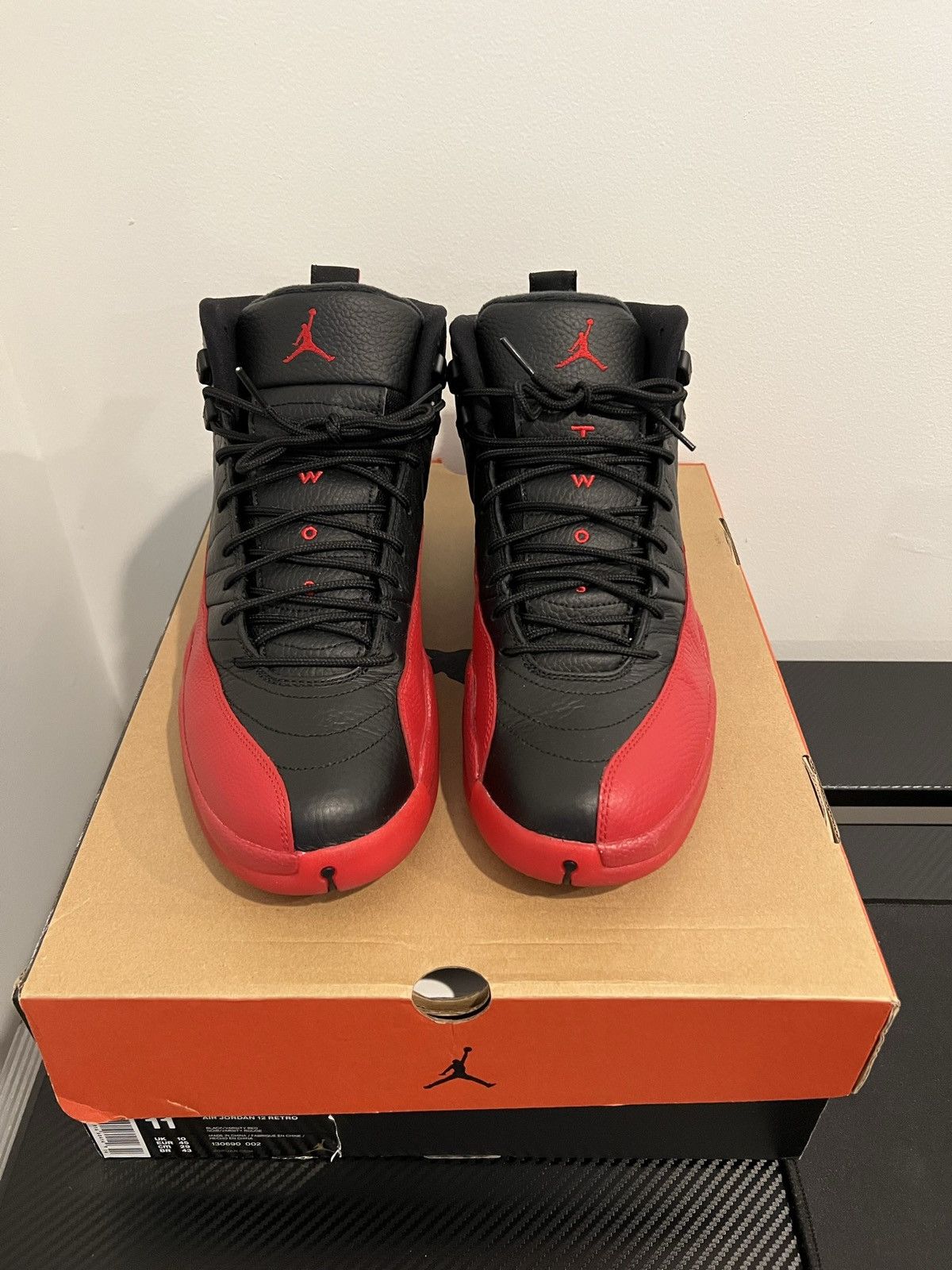 image of Jordan Nike Size 11 - Jordan 12 Retro Mid Flu Game Shoes in Black/Red, Men's