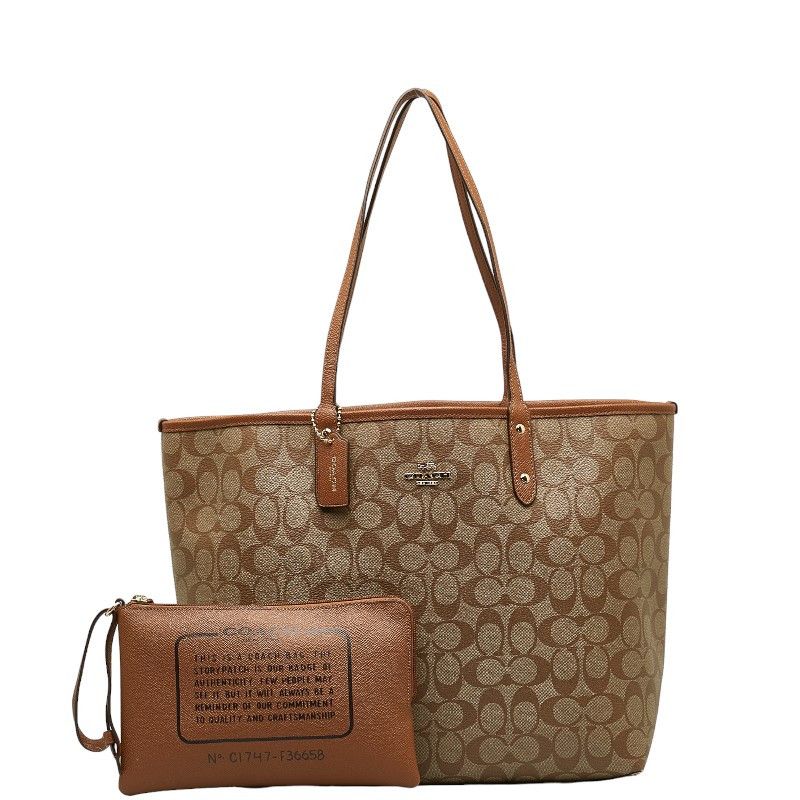 image of Coach Signature Reversible Tote Bag in Brown, Women's