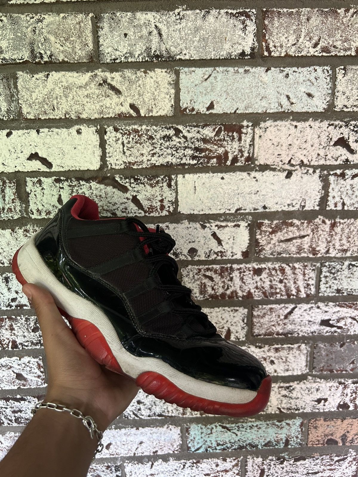 Jordan Brand Jordan 11 Bred Low Size US 12 / EU 45 - 1 Thumbnail
