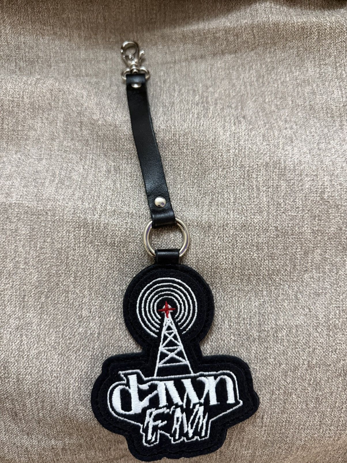 The Weeknd The Weeknd "Dawn FM" Roots Leather Keychain Size ONE SIZE - 1 Thumbnail