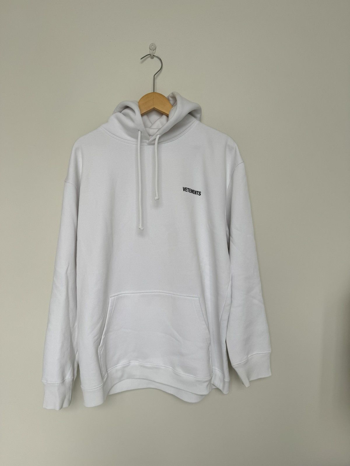 Vetements Logo-print cotton-blend hooded sweatshirt