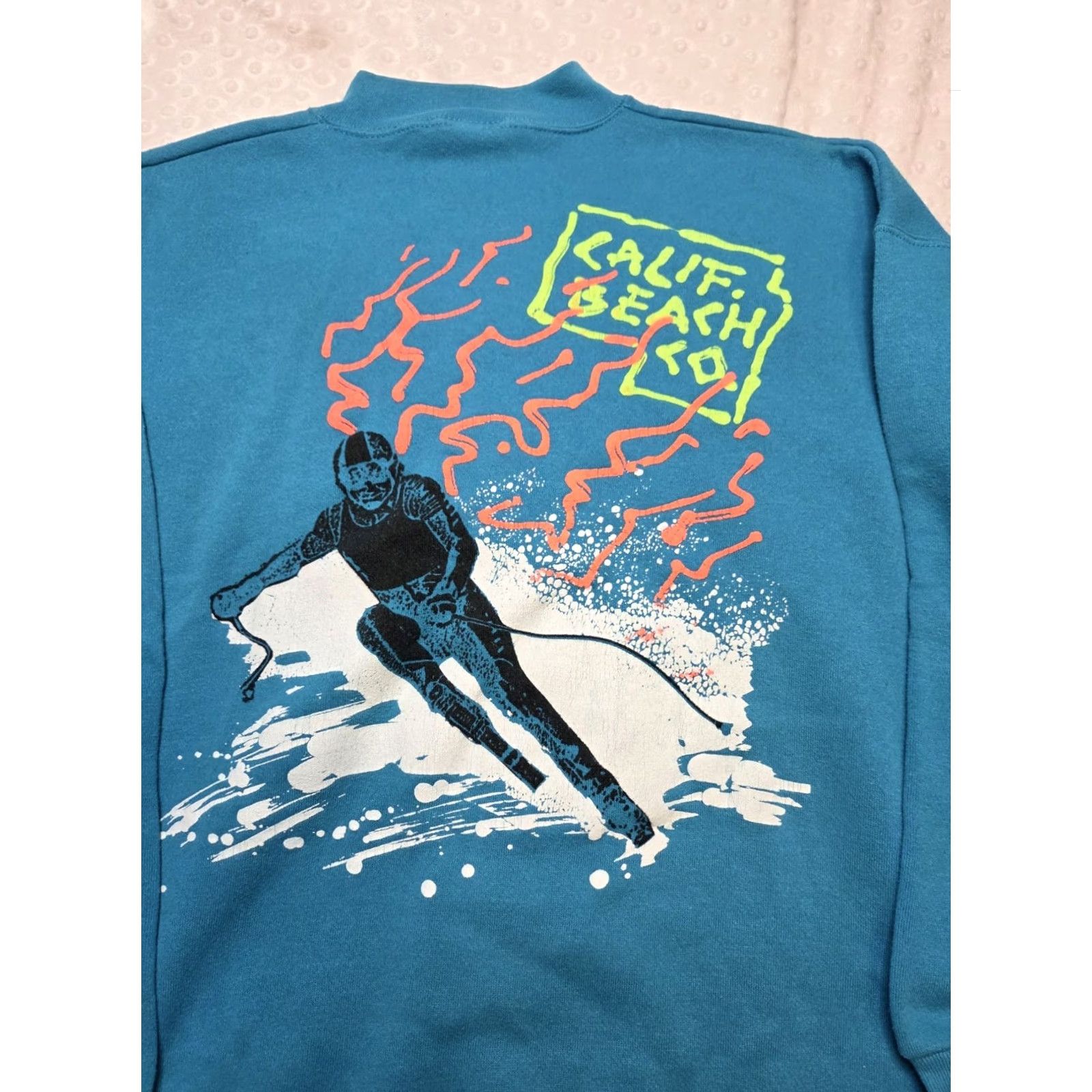 Tultex Tultex Sweatshirt Mens Large Teal California Beach Co. 80s Vintage Ski Graphic Pullover Knit Cotton Long Sleeve Logo 80s Theme Men’s Size L Size US L / EU 52-54 / 3 - 5 Thumbnail