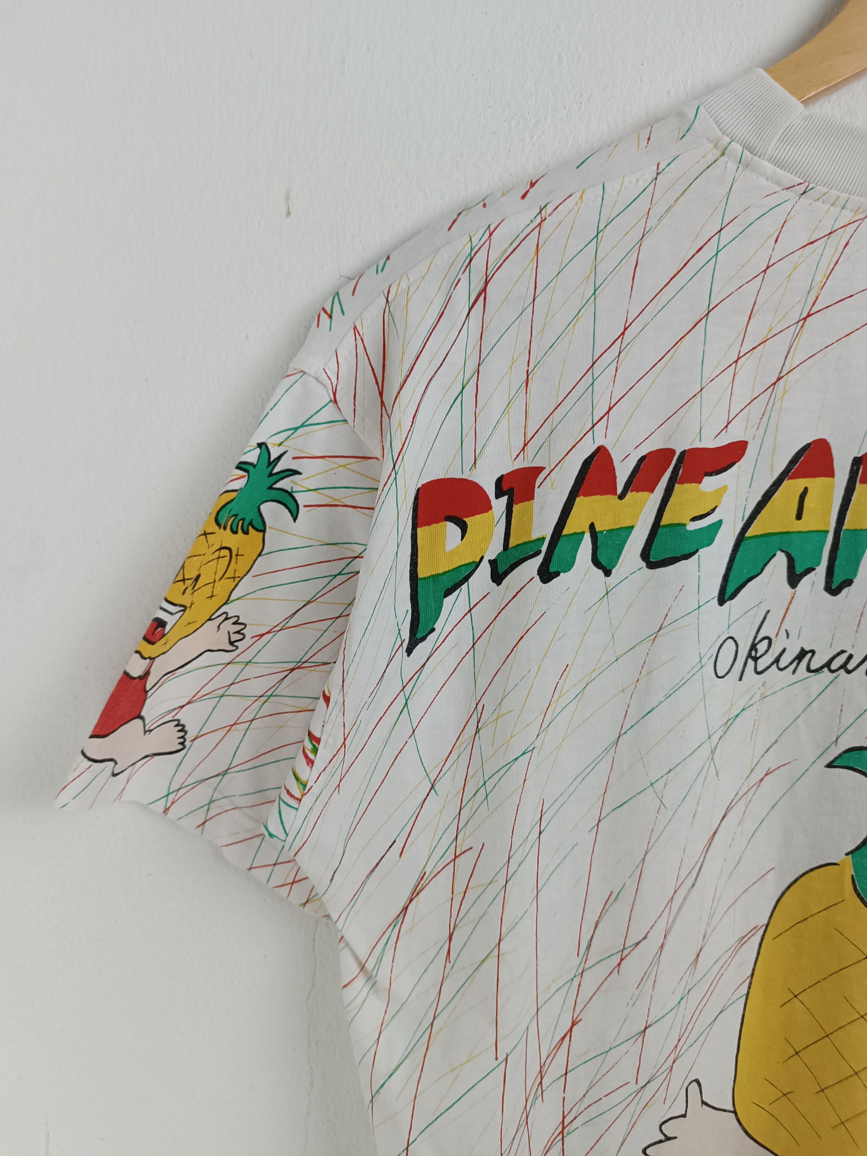 Anime VINTAGE 90'S PINNEAPPLE BOY AOP OKINAWA JAPAN TEE VERY RARE Size US M / EU 48-50 / 2 - 14 Thumbnail