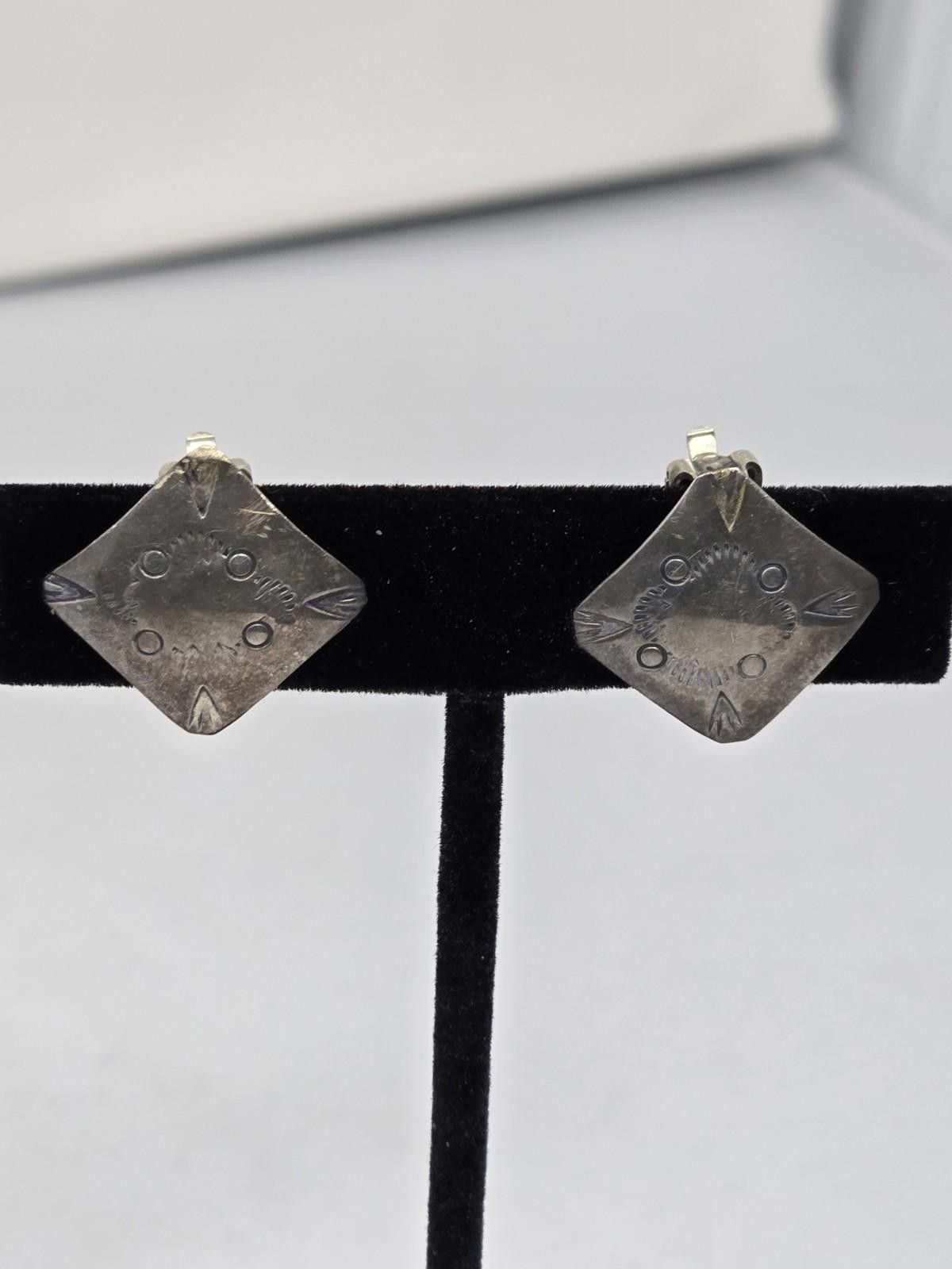 LC Sterling Silver Stamped Diamond Clip Earrings