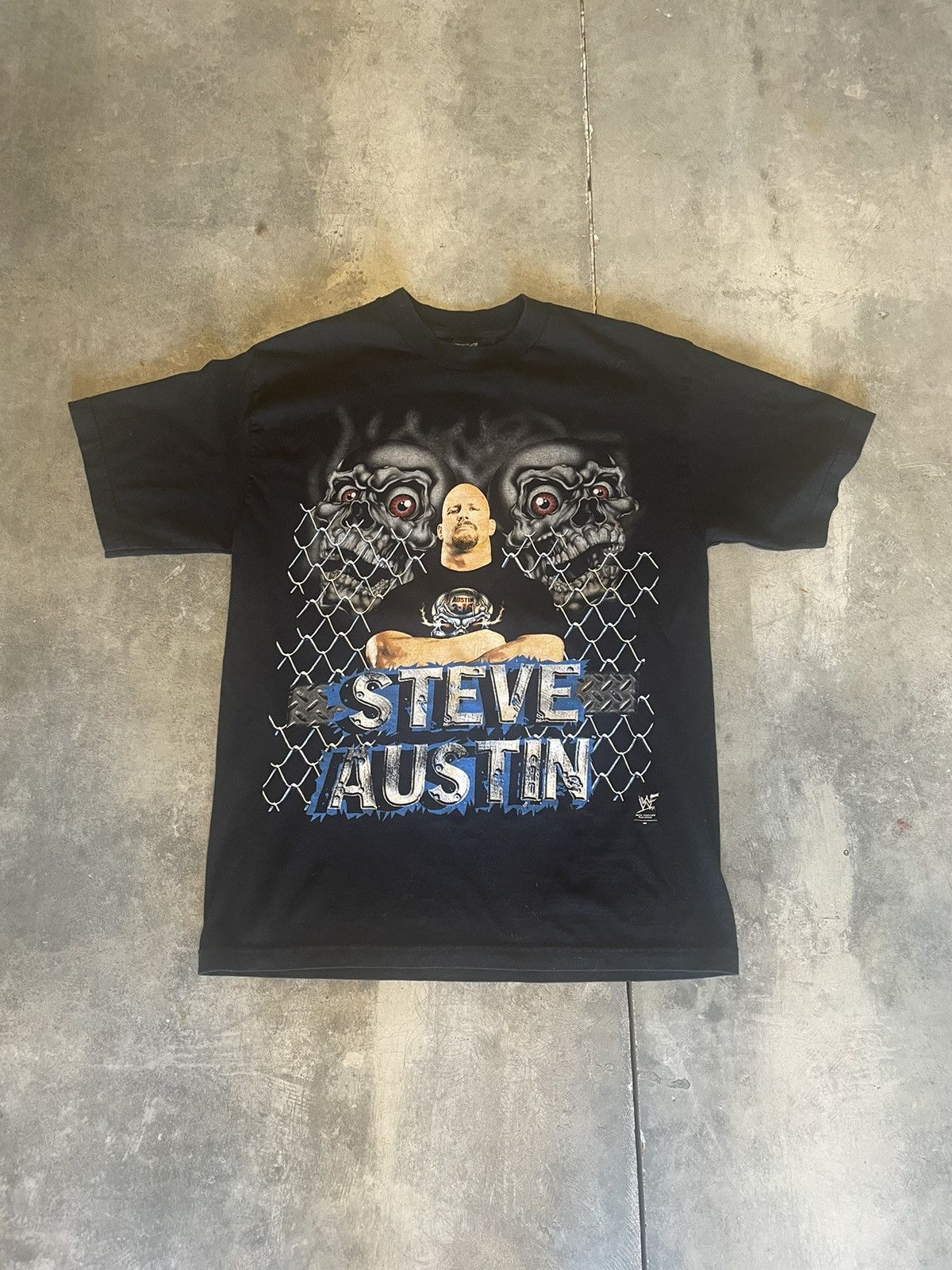 T-shirt graphique WWF pierre froide steve, disponible en plusieurs tailles