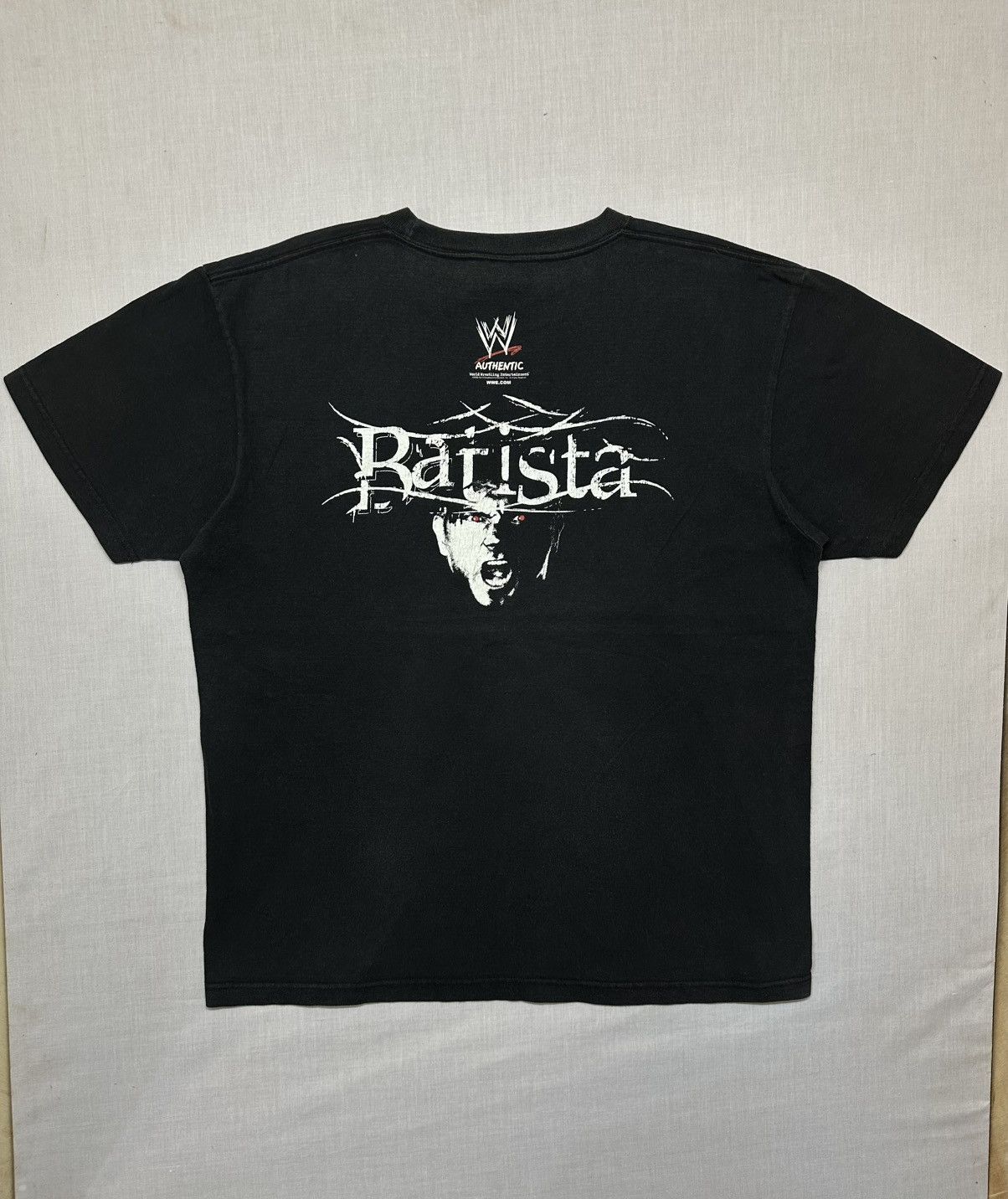 WWE vintage 2005 "Batista The Animal" merchandise tee from WWE. Size US XL / EU 56 / 4 - 1 Thumbnail